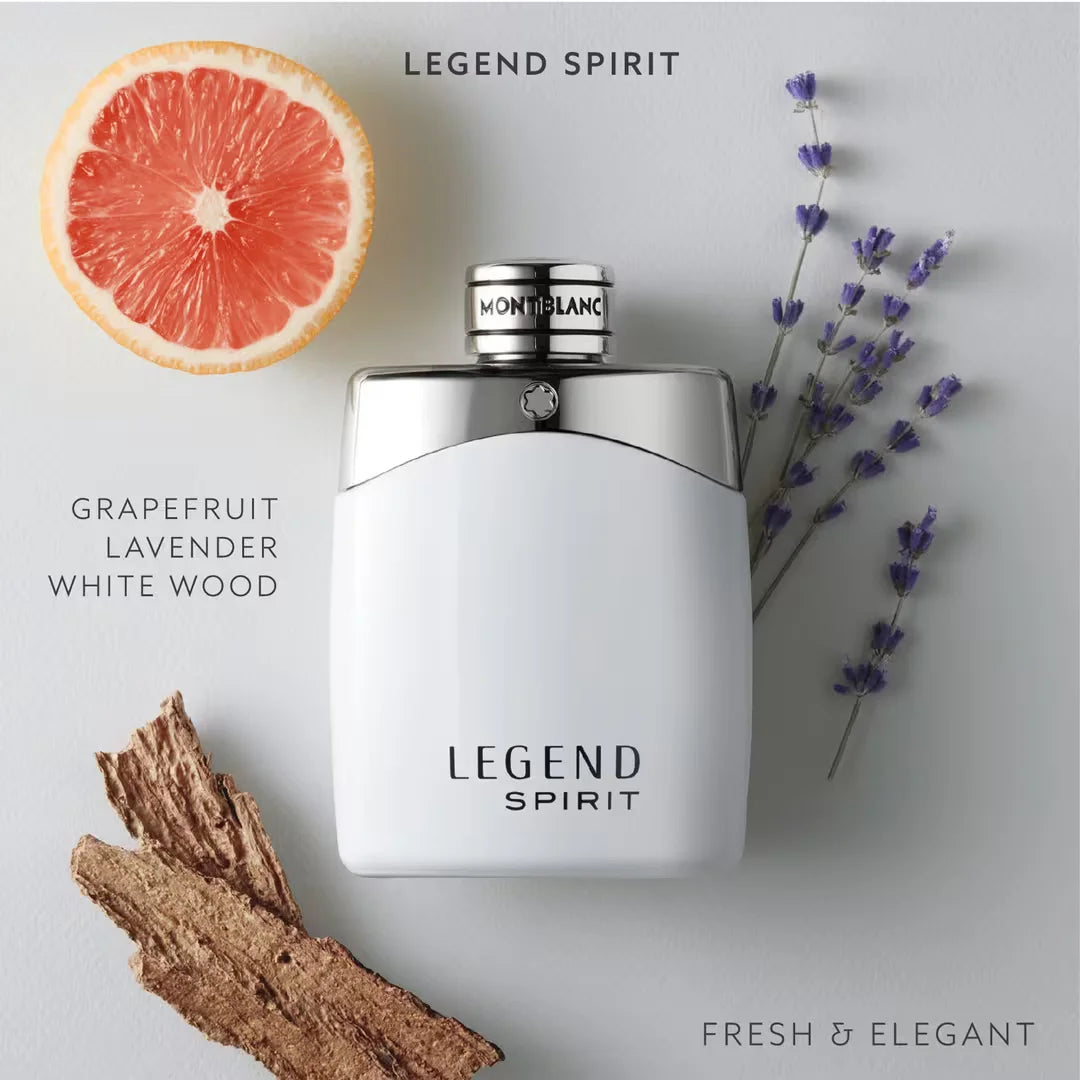 Montblanc Legend Spirit perfume bottle with grapefruit, lavender, and wood elements on a light background