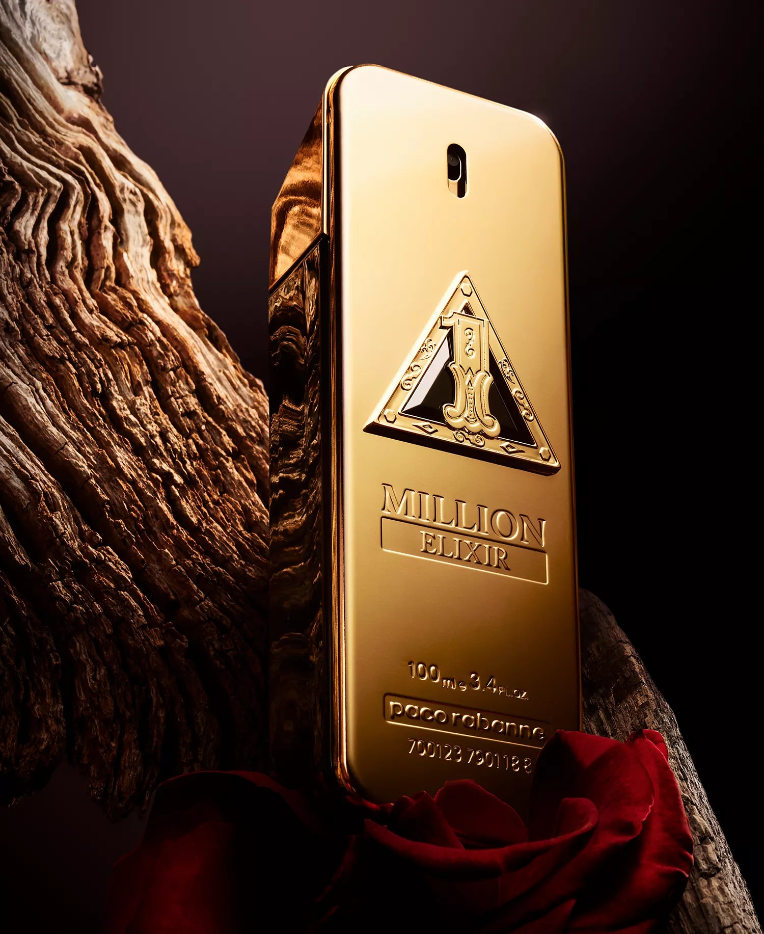 Gold phone case with 'MILLION ELIXIR' branding on a dark background