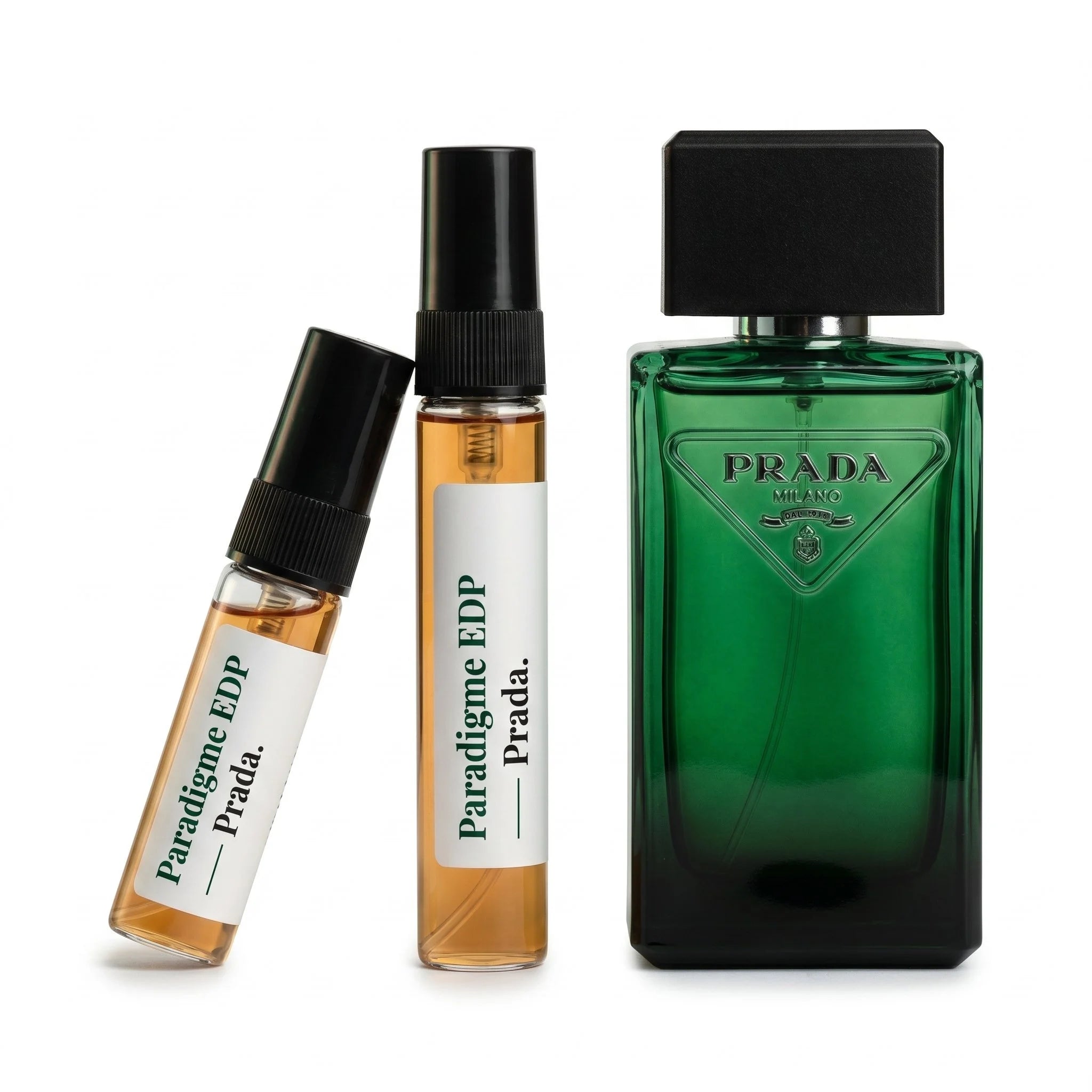Prada Paradigme EDP decant vials with green bottle on white background luxury fragrance product photography