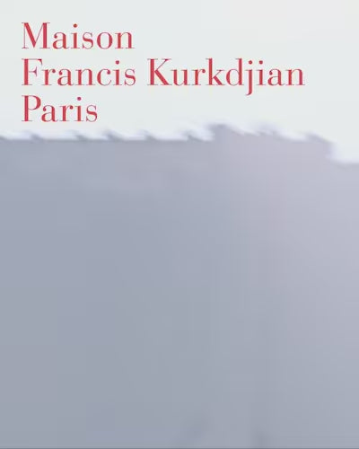 Maison Francis Kurkdjian Paris logo in red text on a soft gradient background, representing the luxury fragrance brand identity.