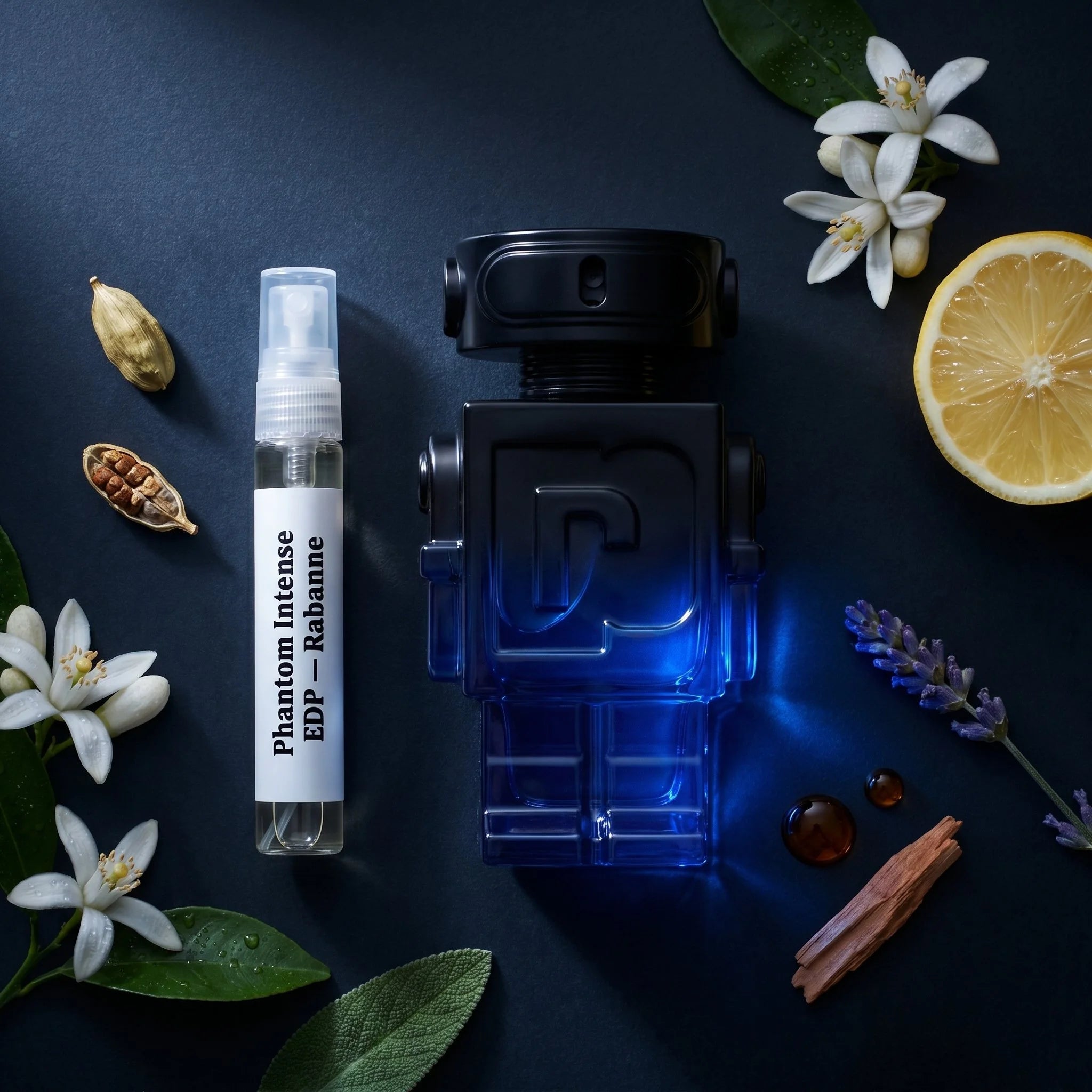 Rabanne Phantom Intense EDP bottle and decant on dark stone with orange blossom lemon cardamom lavender vanilla cedarwood fragrance notes flatlay