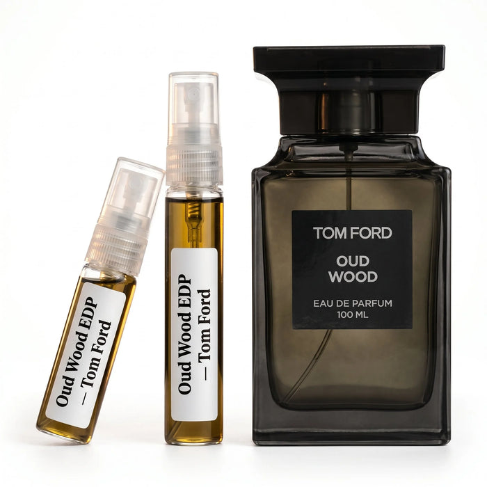 Tom Ford Oud Wood EDP decant vials with dark smoky bottle on white background luxury fragrance photography