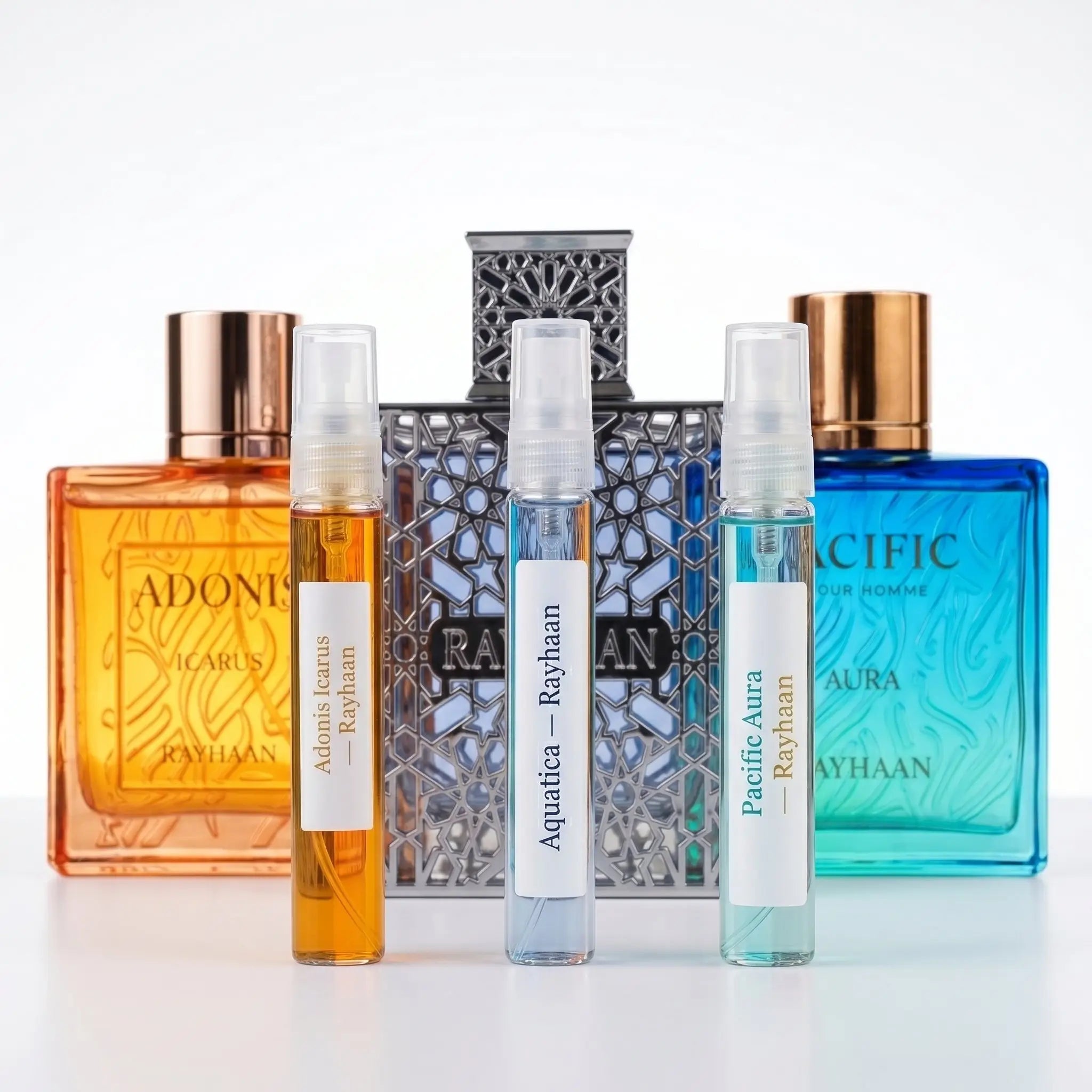 Vacation Mode hero — Rayhaan Adonis Icarus, Aquatica and Pacific Aura bottles with 5ml decants
