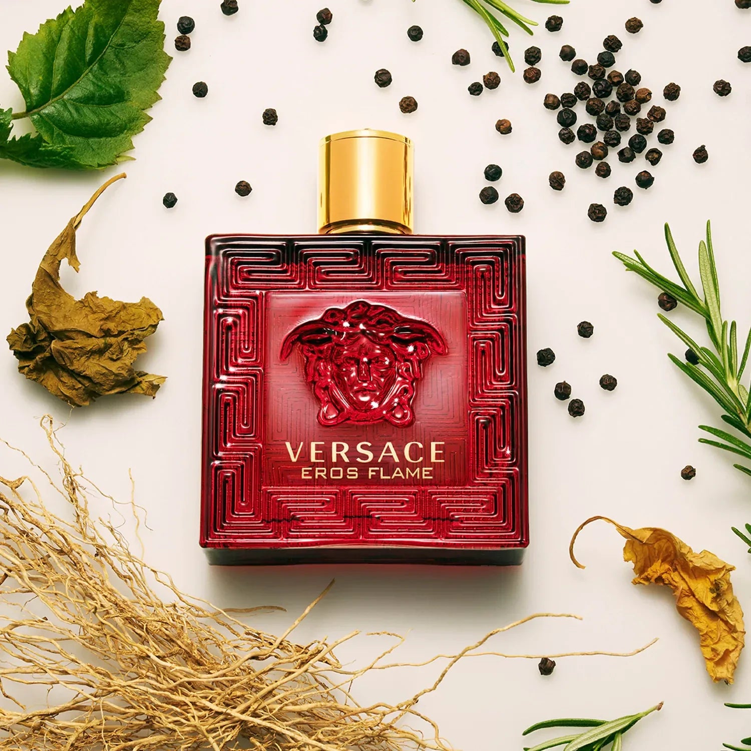Versace Eros Flame men's perfume bottle with natural ingredients including black pepper and rosemary - luxury designer fragrance