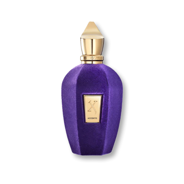 Purple perfume bottle with gold cap on a white background