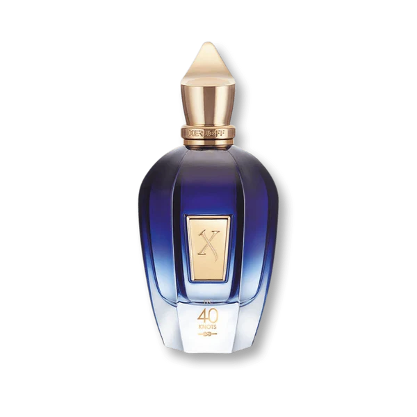 Blue perfume bottle with gold cap on a white background